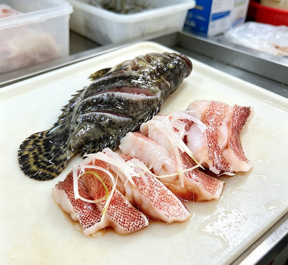 Steamed Whole Fish with Ginger and Chili Garnish